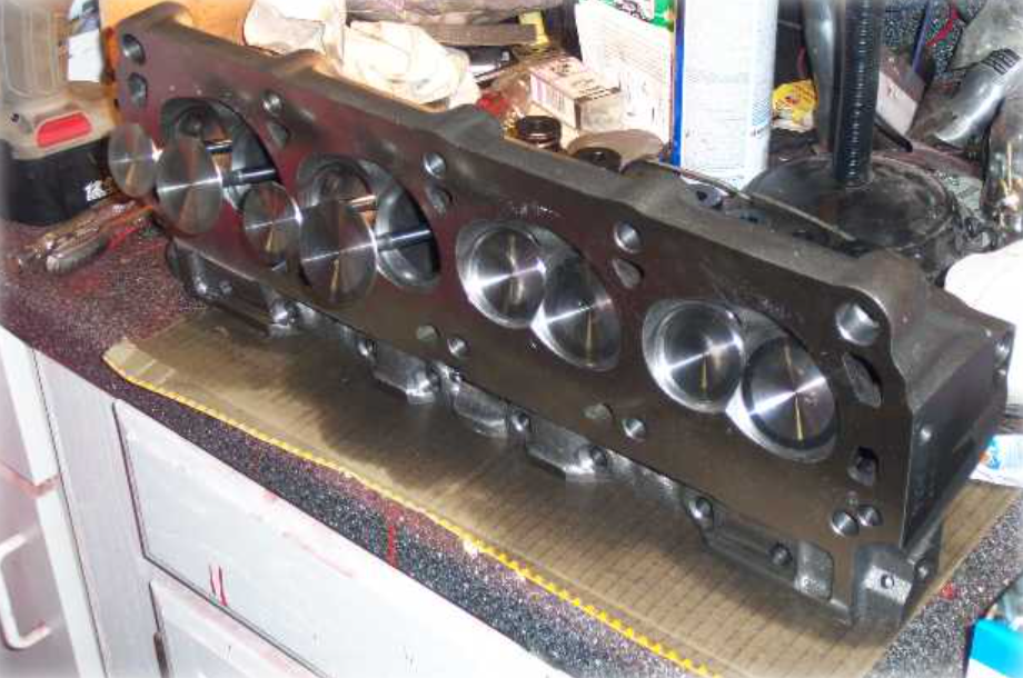 Reconditioned cylinder head on the bench at Mpangele Auto Engineering