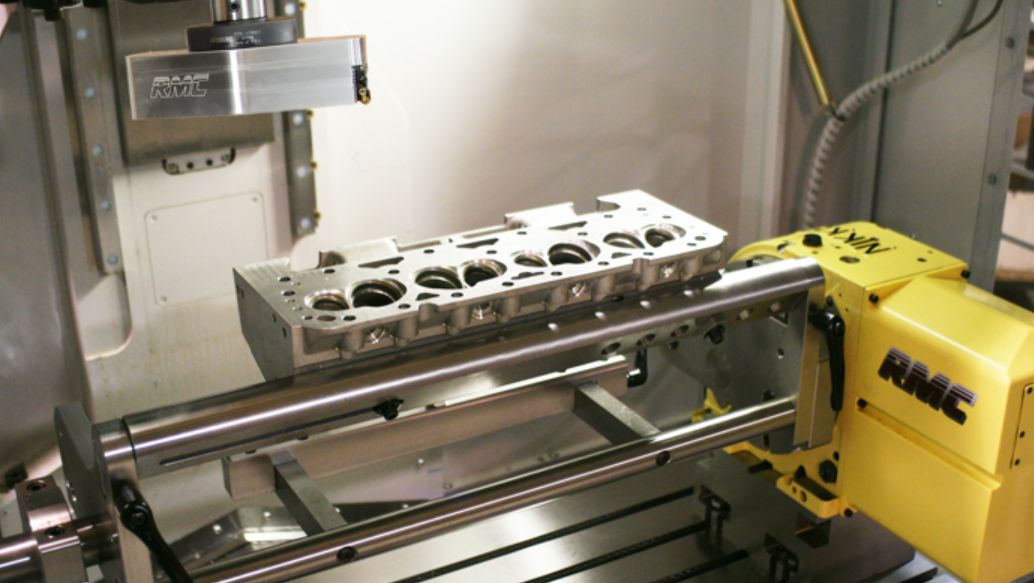 Cylinder head being machined on the seat refacing setup at Mpangele Auto Engineering